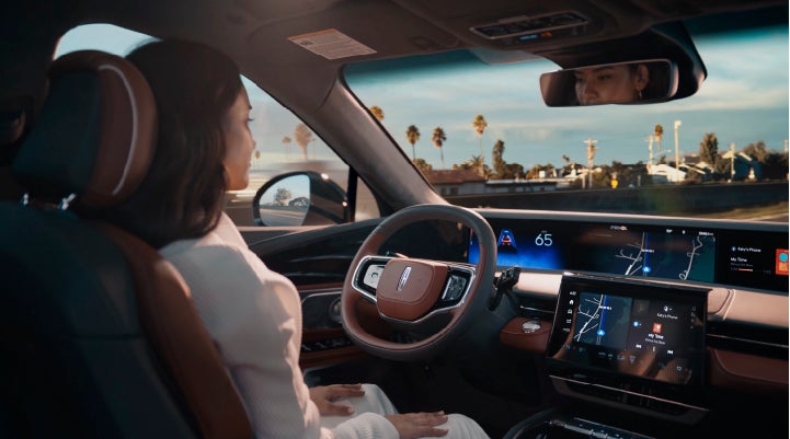 A person is shown driving hands-free on the highway with available Lincoln BlueCruise technology. | Evergreen Lincoln in Issaquah WA