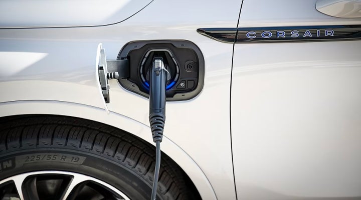 An electric charger is shown plugged into the charging port of a Lincoln Corsair® Grand Touring
model. | Evergreen Lincoln in Issaquah WA