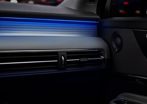 A thin available ambient blue lighting illuminates the pinstripe aluminum under an ebony dashboard, emitting a cool energy | Evergreen Lincoln in Issaquah WA
