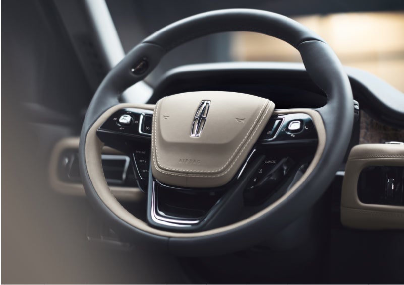 The intuitively placed controls of the steering wheel on a 2023 Lincoln Aviator® SUV | Evergreen Lincoln in Issaquah WA