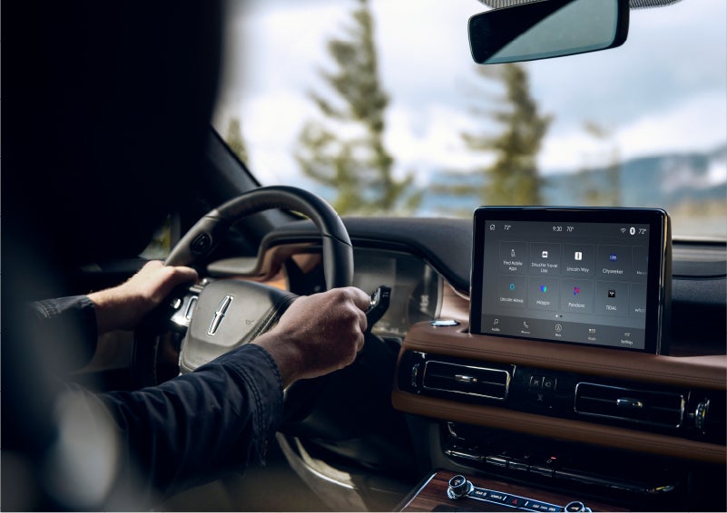 The Lincoln+Alexa app screen is displayed in the center screen of a 2023 Lincoln Aviator® Grand Touring SUV | Evergreen Lincoln in Issaquah WA